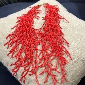 1946 coral colored beaded necklace